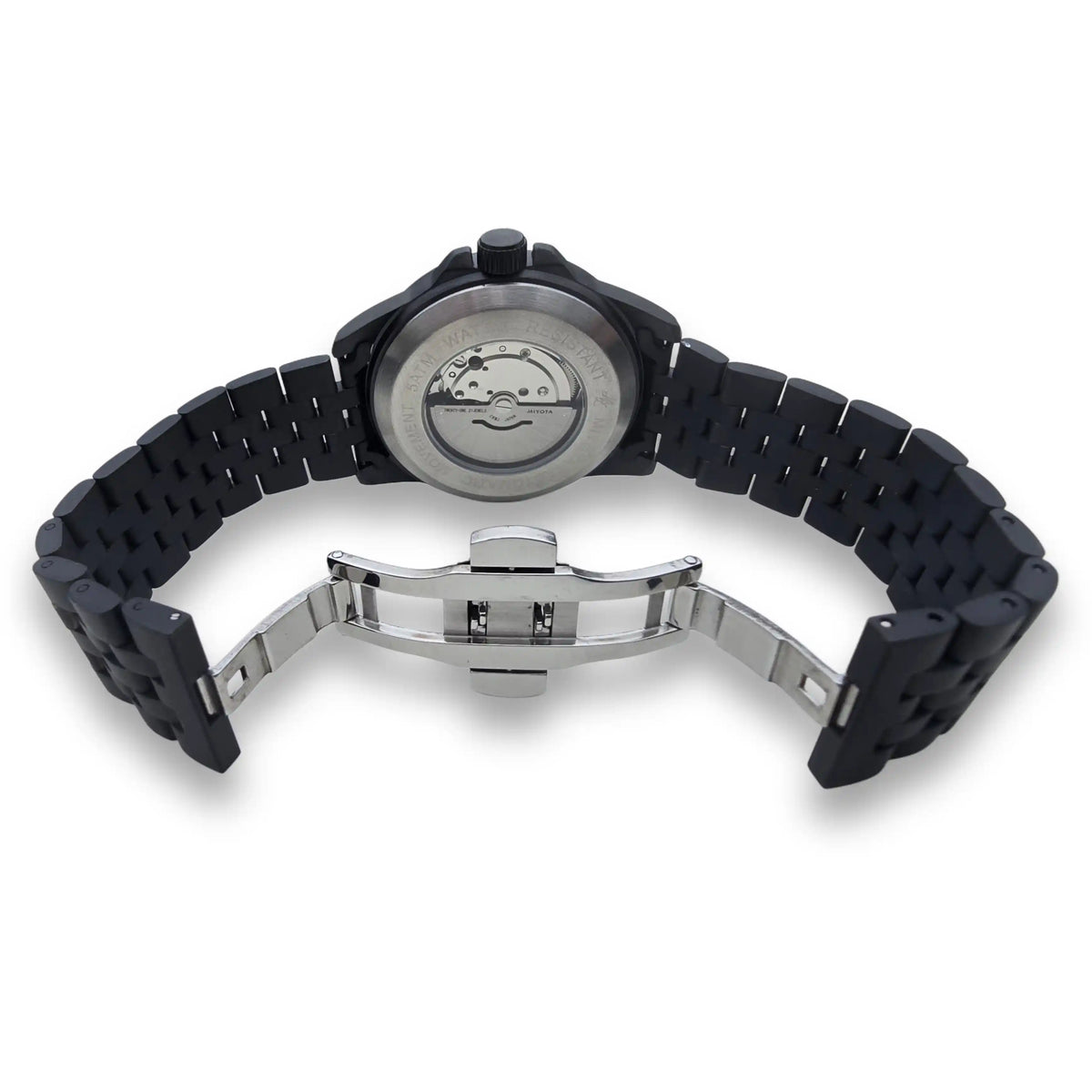 Parte trasera del reloj MVL AK47 negro con mecanismo visible y cierre desplegable plateado